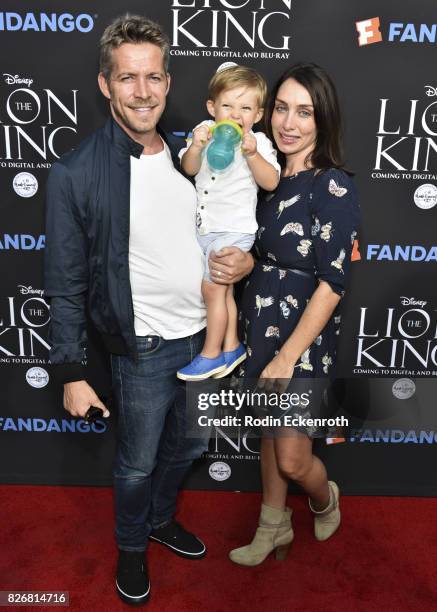 Actor Sean Maguire, wife Tanya Flynn, and son Flynn Patrick Maguire attend "The Lion King" sing-along screening at The Greek Theatre on August 5,...