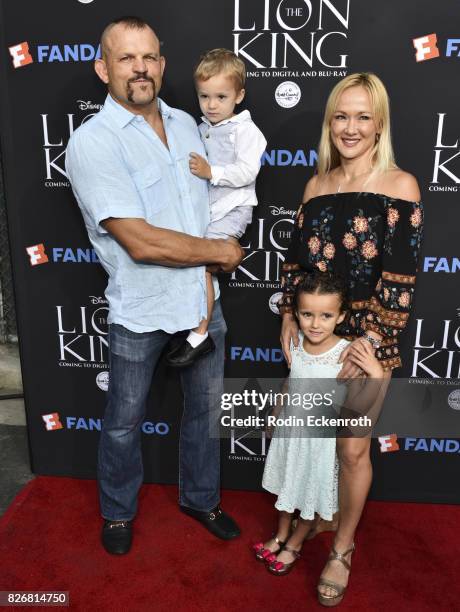 Former UFC Heavyweight Champion Chuck Liddell, wife Heidi Northcott, Brendan Liddell, and Trista Liddell attend "The Lion King" sing-along screening...