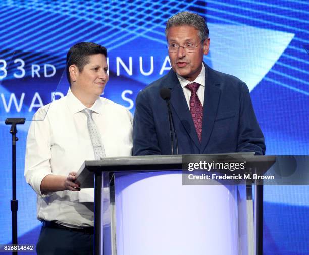 The Hollywood Reporter's Lesley Goldberg and USA Today's Robert Bianco present the award for 'Outstanding New Program' onstage at the 33rd Annual...