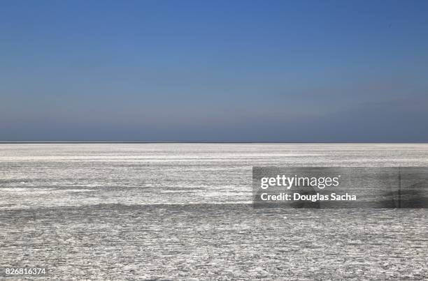frozen landscape over lake erie - ice storm stock pictures, royalty-free photos & images