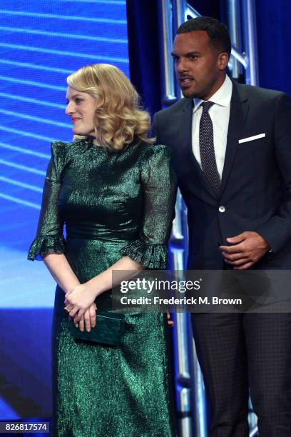 Actors Elisabeth Moss and O. T. Fagbenle accept the award for 'Program of the Year' for 'The Handmaid's Tale' onstage at the 33rd Annual Television...