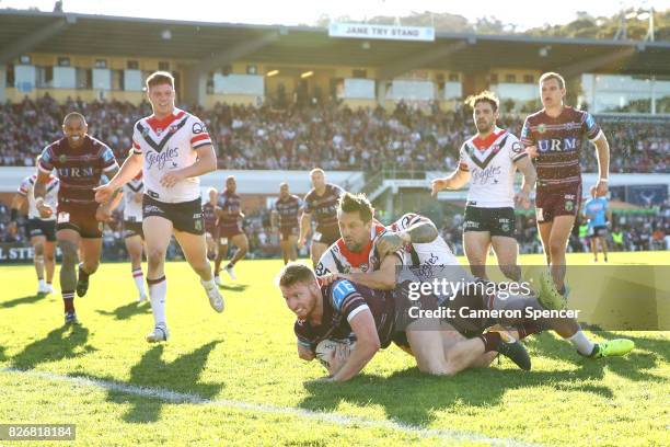 Bradley Parker of the Sea Eagles scores a try during the round 22 NRL match between the Manly Warringah Sea Eagles and the Sydney Roosters at...