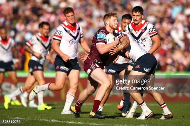 Bradley Parker of the Sea Eagles runs the ball during the round 22 NRL match between the Manly Warringah Sea Eagles and the Sydney Roosters at...