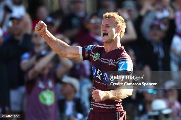 Daly Cherry-Evans of the Sea Eagles celebrates scoring a try during the round 22 NRL match between the Manly Warringah Sea Eagles and the Sydney...