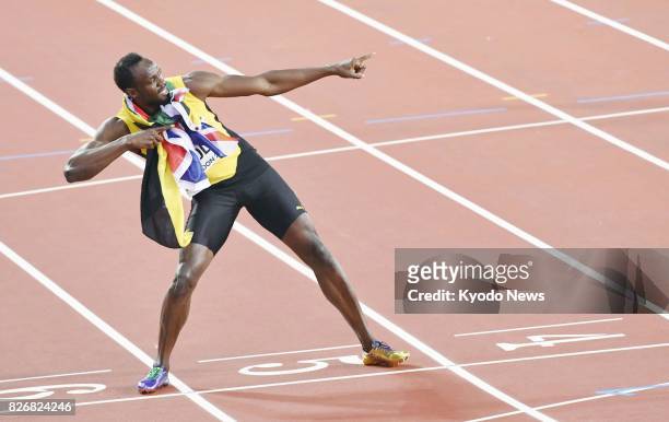 Usain Bolt of Jamaica poses after finishing third in the men's 100-meter final at the World Athletics Championships in London on Aug. 5, 2017. ==Kyodo