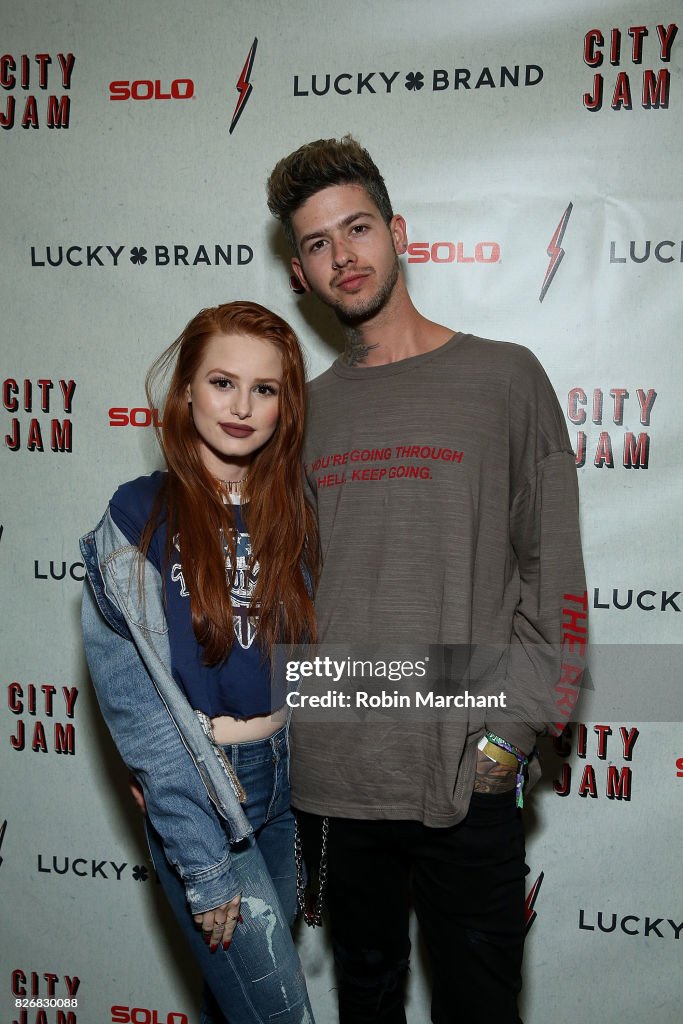 Madelaine Petsch and Travis Mills attend Lucky Brand Presents