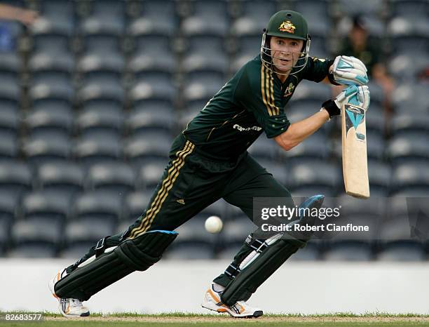 Michael Clarke of Australia plays a shot during the third one day international match between Australia and Bangladesh held at TIO Stadium on...