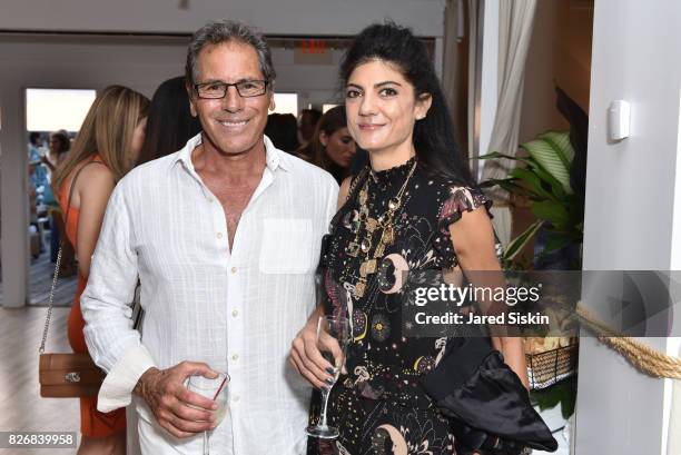 Vince Veppizzi and Kristin Paquette attend Women's Health and FEED's 6th Annual Party Under the Stars at Bridgehampton Tennis and Surf Club on August...