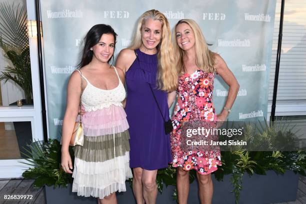 Courtney Daniels, Jen Bawden and Paige Rosscetter attend Women's Health and FEED's 6th Annual Party Under the Stars at Bridgehampton Tennis and Surf...