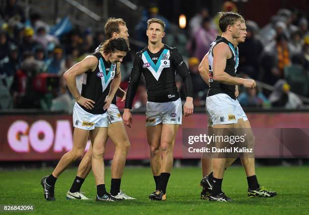 Power defenders look on dejected during the round 20 AFL match between the Adelaide Crows and the Port Adelaide Power at Adelaide Oval on August 6,...