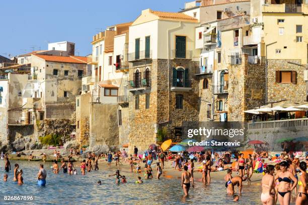 cefalu beach in sicily, italy - gulf of palermo stock pictures, royalty-free photos & images