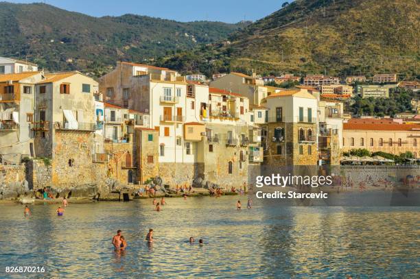 cefalu beach in sicily, italy - gulf of palermo stock pictures, royalty-free photos & images