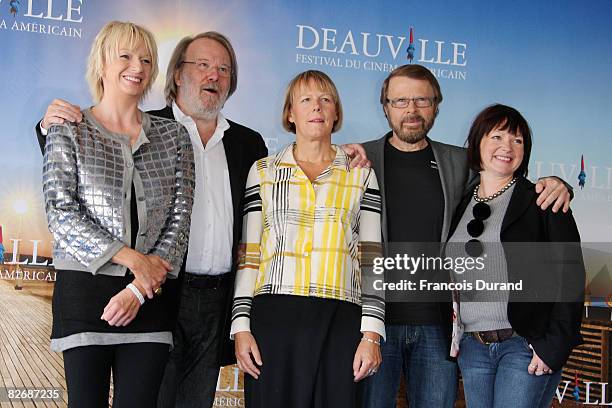 Composers Bjorn Ulvaeus and Benny Anderson of the Swedish group Abba pose with British playwriter Catherine Johnson , producer Judy Cramer and...