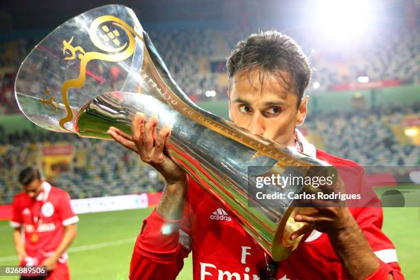 Benfica's forward Jonas from Brasil with Portuguese Super Cup trophy after the match between SL Benfica and VSC Guimaraes at Estadio Municipal de...