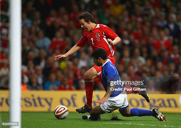 Chris Gunter of Wales is brought down by Rashad Sadikhov of Azerbaijan for a penalty during the FIFA 2010 World Cup Group Four Qualifying match...