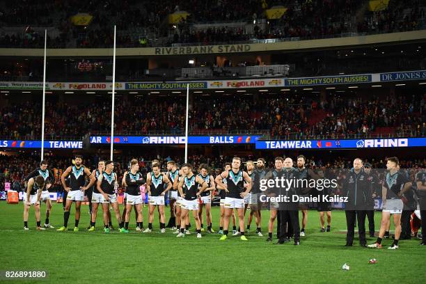 Power players look on dejected after the round 20 AFL match between the Adelaide Crows and the Port Adelaide Power at Adelaide Oval on August 6, 2017...
