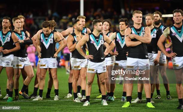 Power players look on dejected after the round 20 AFL match between the Adelaide Crows and the Port Adelaide Power at Adelaide Oval on August 6, 2017...