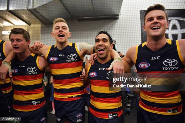 Crows players sing the club song after the round 20 AFL match between the Adelaide Crows and the Port Adelaide Power at Adelaide Oval on August 6,...