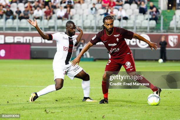 Yannis Salibur of Guingamp and Benoit Assou Ekoto of Metz during the Ligue 1 match between Metz and EA Guingamp on August 5, 2017 at Stade Symphorien...