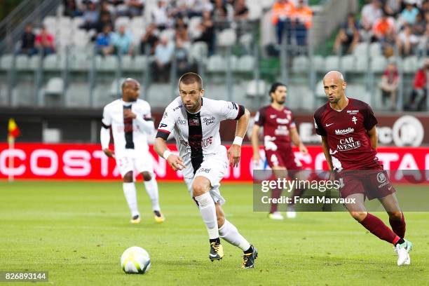 Lucas Deaux of Guingamp and Renaud Cohade of Metz during the Ligue 1 match between Metz and EA Guingamp on August 5, 2017 at Stade Symphorien in Metz,