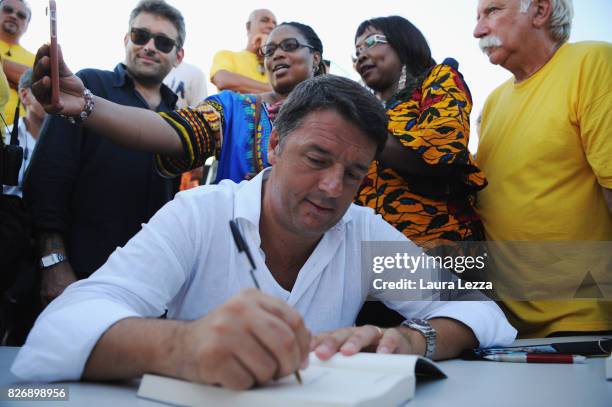 Italian politician Matteo Renzi, Secretary of the Democratic Party attends the presentation of his new book 'Avanti' and signs copies on August 5,...