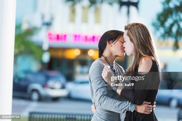 young lesbian couple, kissing - asian lesbians kiss stock pictures, royalty-free photos & images