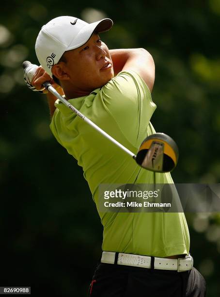 Anthony Kim hits his tee shot on the ninth hole during the weather-delayed second round of the BMW Championship on September 6, 2008 at Bellerive...