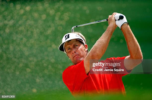 Stuart Appleby of Australia hits his second shot from a trap on the 7th hole during the second round of the BMW Championship on September 6, 2008 at...