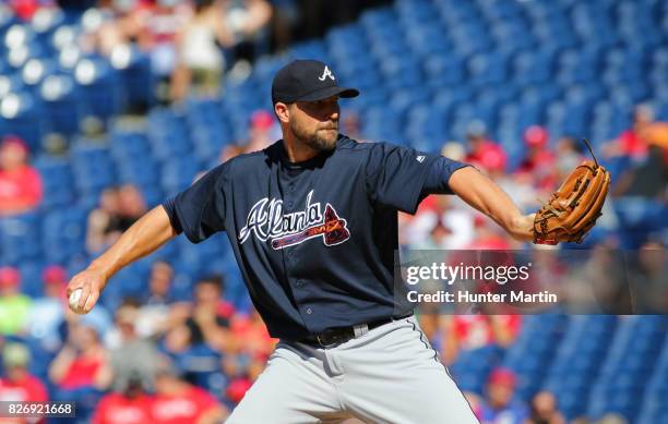 Jim Johnson of the Atlanta Braves throws a pitch in the eighth inning during a game against the Philadelphia Phillies at Citizens Bank Park on July...