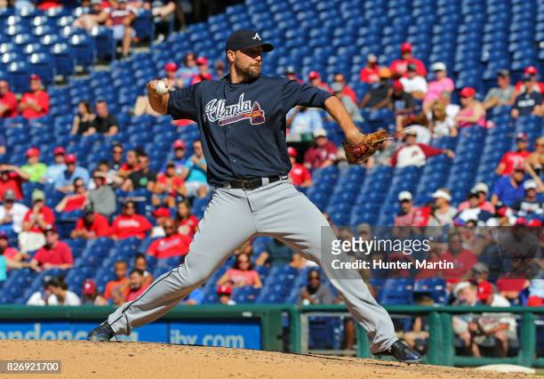 Jim Johnson of the Atlanta Braves throws a pitch in the eighth inning during a game against the Philadelphia Phillies at Citizens Bank Park on July...
