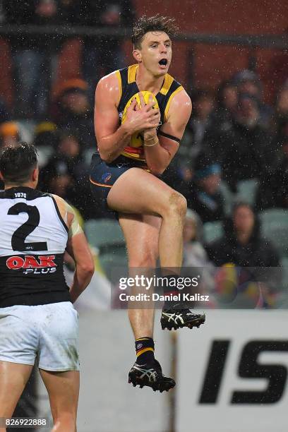 Jake Lever of the Crows marks the ball during the round 20 AFL match between the Adelaide Crows and the Port Adelaide Power at Adelaide Oval on...