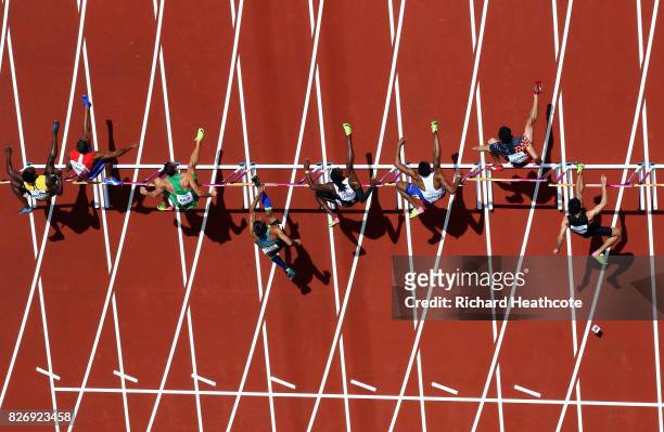 Athletes take the first hurdle in the Men's 110 metres hurdles during day three of the 16th IAAF World Athletics Championships London 2017 at The...