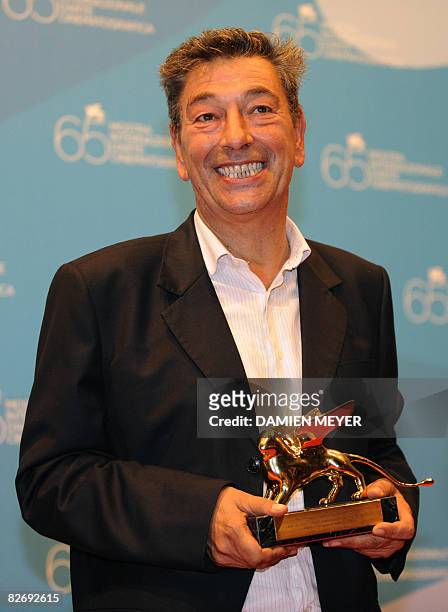 Italy's director Gianna Di Gregorio poses with the "Luigi De Laurentis" award after the closing ceremony of the 65th Venice International Film...