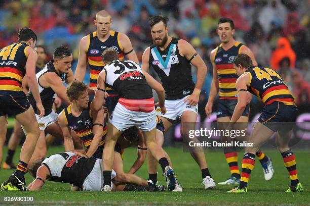 Jack Hombsch of the Power competes the ball during the round 20 AFL match between the Adelaide Crows and the Port Adelaide Power at Adelaide Oval on...