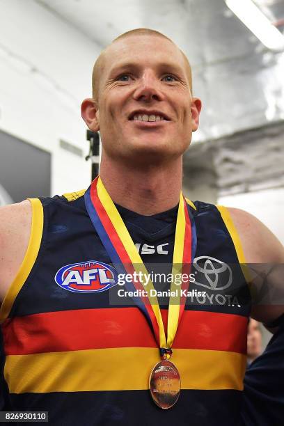 Sam Jacobs of the Crows sings the club song after the round 20 AFL match between the Adelaide Crows and the Port Adelaide Power at Adelaide Oval on...