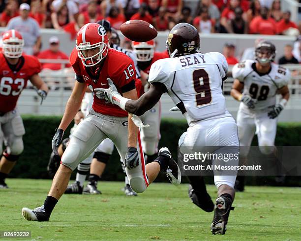 Defensive back Bobby Seay of the Central Michigan Chippewas breks up a pass to split end Kris Durham the Georgia Bulldogs at Sanford Stadium on...