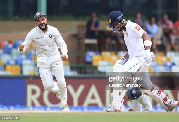 Indian cricket captain Virat Kolhi in celebration mood after Sri Lankan captain Dinesh Chandimal was dismissed during the 4th Day's play in the 2nd...