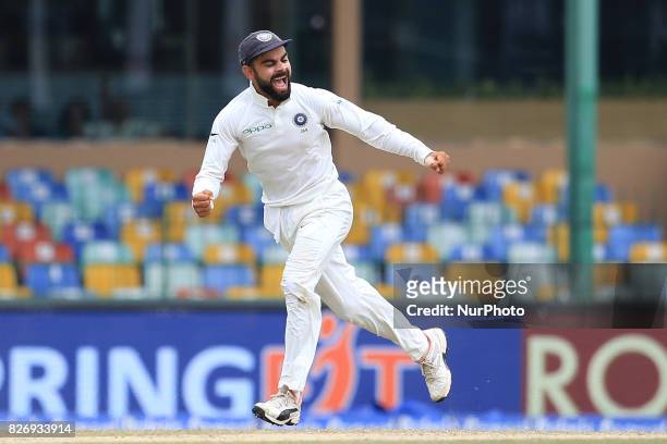 Indian cricket captain Virat Kolhi in celebration mood after Sri Lankan captain Dinesh Chandimal was dismissed during the 4th Day's play in the 2nd...