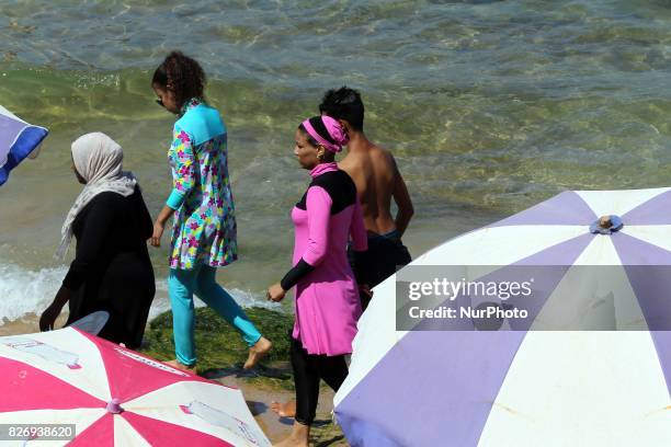 Algerian women wear a &quot;burkini&quot; in the sea at the beach of Oran, West of Algiers on 5 August 2017.