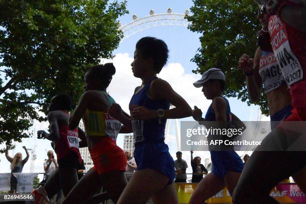 Kenya's Helah Jelagat Kiprop competes in the women's marathon athletics event at the 2017 IAAF World Championships in central London on August 6,...