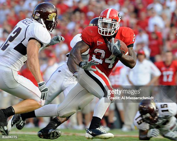 Running back Knowshon Moreno of the Georgia Bulldogs rushes upfield against the Central Michigan Chippewas at Sanford Stadium on September 6, 2008 in...
