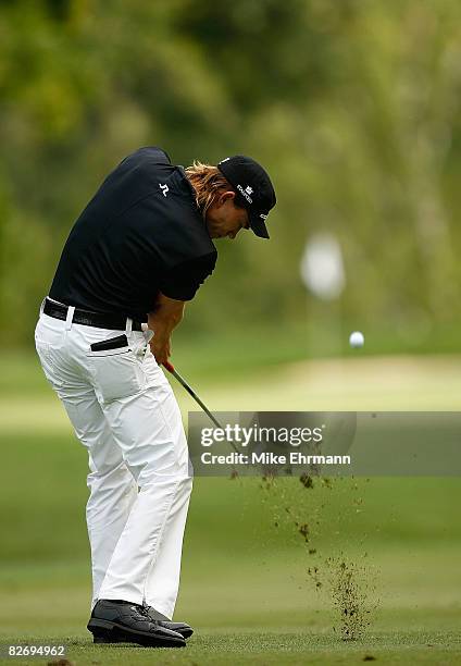 Camilo Villegas hits his approach on the 12th hole during the third round of the BMW Championship on September 6, 2008 at Bellerive Country Club in...