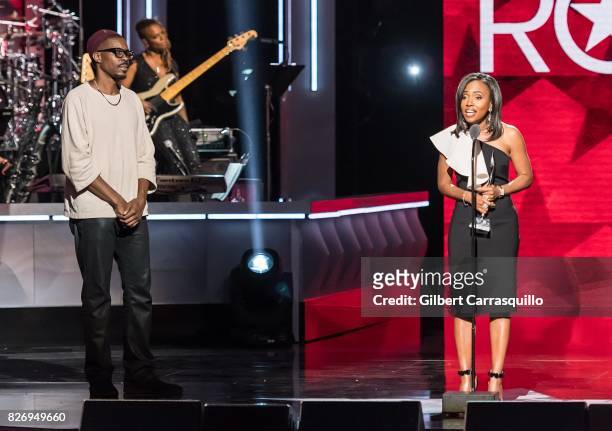 Honoree Suzanne Schank accepts her award from Wood Harris onstage during Black Girls Rock! 2017 at New Jersey Performing Arts Center on August 5,...
