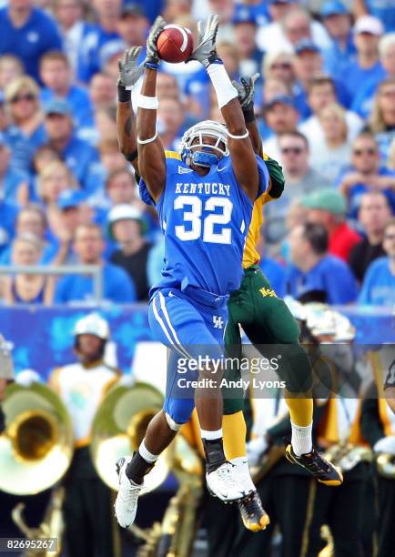 Trevard Lindley of the Kentucky Widcats intercepts a pass during the game against the Norfolk State Spartans at Commonwealth Stadium on September 6,...