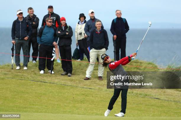 Mi Hyang Lee of Korea hits her second shot on the 4th hole during the final round of the Ricoh Women's British Open at Kingsbarns Golf Links on...