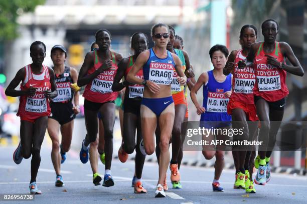 Bahrain's Rose Chelimo, Kenya's Helah Jelagat Kiprop, US athlete Amy Cragg and Kenya's Edna Ngeringwony Kiplagat compete in the women's marathon...