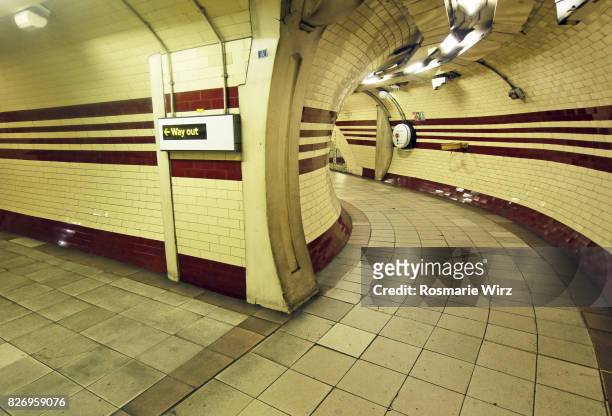 underground passageway at hampstead tube station - 1907 2015 stock pictures, royalty-free photos & images
