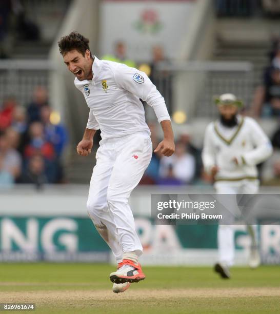 Duanne Olivier of South Africa celebrates after dismissing Ben Stokes of England during the third day of the 4th Investec Test match between England...