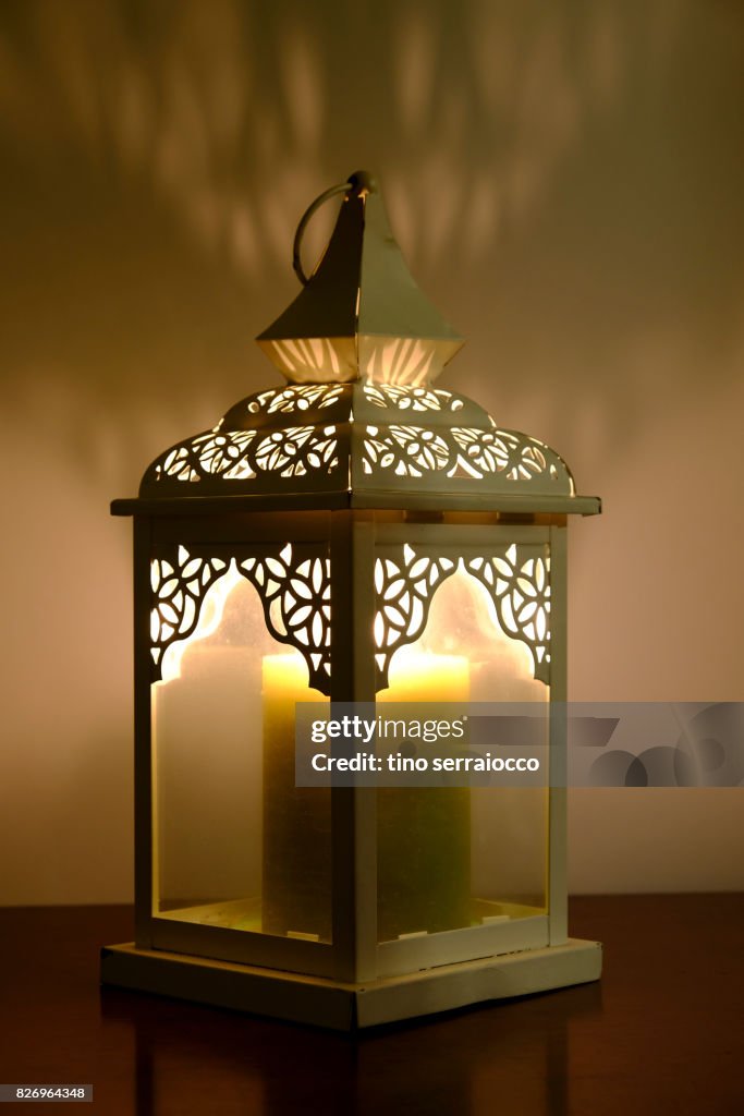 Old lantern with candle