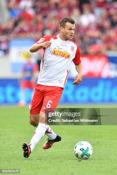 Benedikt Saller of SSV Jahn Regensburg plays the ball during the Second Bundesliga match between SSV Jahn Regensburg and 1. FC Nuernberg at...